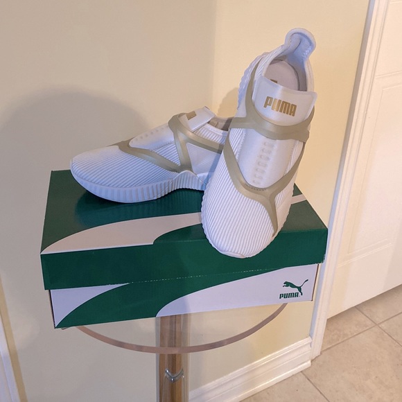 Puma Shoes - New Puma Defy Cage Performance Sneakers 👟 in white & silver. Stretchy textile.